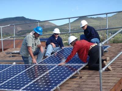Participants in the Energy Department's Train-the-Trainers program in the Rocky Mountain region take part in a roof-mount solar panel install lab exercise at Solar Energy International's PV Lab Yard in Paonia, CO, in the summer of 2010. | Photo courtesy of Solar Energy International Participants in the Energy Department's Train-the-Trainers program in the Rocky Mountain region take part in a roof-mount solar panel install lab exercise at Solar Energy International's PV Lab Yard in Paonia, CO, in the summer of 2010. | Photo courtesy of Solar Energy International