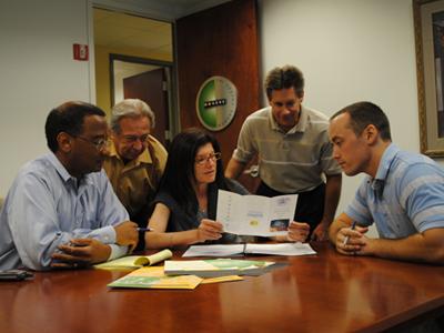 Judith Mondre meets with members of the Mondre Energy team. | Photo courtesy of Judith Mondre Judith Mondre meets with members of the Mondre Energy team. | Photo courtesy of Judith Mondre