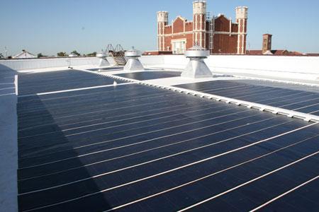 View of the solar panel system atop Warren Easton Senior High School in New Orleans. | Photo courtesy of Entergy Corp View of the solar panel system atop Warren Easton Senior High School in New Orleans. | Photo courtesy of Entergy Corp