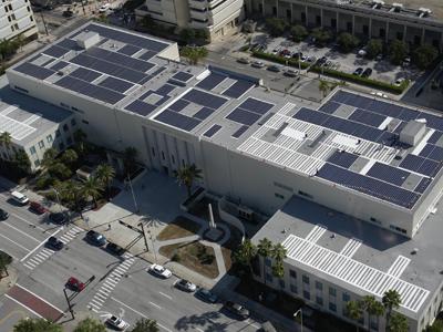 Eco Technologies, Inc., hired eleven workers to install these solar panels at the Hillsborough County judicial center. | Photo courtesy of Hillsborough County Eco Technologies, Inc., hired eleven workers to install these solar panels at the Hillsborough County judicial center. | Photo courtesy of Hillsborough County