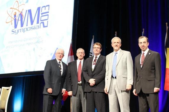 WM Symposia Board Chairman James Gallagher, left to right, U.S. Nuclear Regulatory Commission Member William Ostendorff, Natural Resources Canada Uranium & Radioactive Waste Division Director Dave McCauley, EM Senior Advisor Dave Huizenga and WM Symposia Board Member Fred Sheil gather for a photo at the Waste Management Conference. WM Symposia Board Chairman James Gallagher, left to right, U.S. Nuclear Regulatory Commission Member William Ostendorff, Natural Resources Canada Uranium & Radioactive Waste Division Director Dave McCauley, EM Senior Advisor Dave Huizenga and WM Symposia Board Member Fred Sheil gather for a photo at the Waste Management Conference.