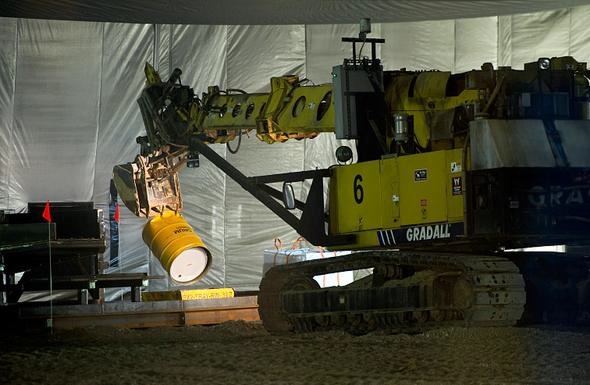 A waste retrieval facility constructed over a former buried radioactive waste disposal cell known as Pit 9 at the Idaho site has been repurposed for treating 6,000 drums of sludge waste left over from the Cold War weapons program. A waste retrieval facility constructed over a former buried radioactive waste disposal cell known as Pit 9 at the Idaho site has been repurposed for treating 6,000 drums of sludge waste left over from the Cold War weapons program.