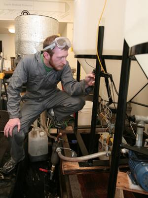 Zach Waickman works on a biodiesel project at Loyola University. | Photo courtesy of Mark Beane, Loyola University Zach Waickman works on a biodiesel project at Loyola University. | Photo courtesy of Mark Beane, Loyola University
