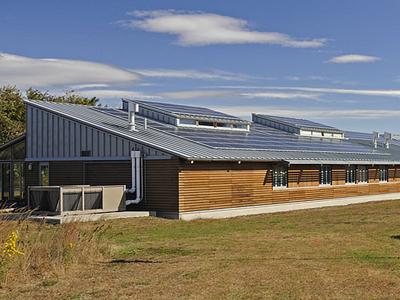 The 112-panel solar photovoltaic system at Parker River National Wildlife Refuge's visitor center and administrative building generates about 35% of the facility’s average electricity needs. | Photo courtesy of Parker River National Wildlife Refuge The 112-panel solar photovoltaic system at Parker River National Wildlife Refuge's visitor center and administrative building generates about 35% of the facility’s average electricity needs. | Photo courtesy of Parker River National Wildlife Refuge