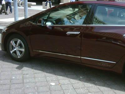 A member of the Energy Empowers team takes the Honda FCX Clarity for a drive outside the U.S. Department of Energy in Washington, D.C. | Photo by Sunita Satyapal A member of the Energy Empowers team takes the Honda FCX Clarity for a drive outside the U.S. Department of Energy in Washington, D.C. | Photo by Sunita Satyapal