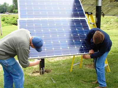 IBEW 725 electricians install solar panels at the union's hall in Terre Haute. | Photo courtesy of IBEW 725 IBEW 725 electricians install solar panels at the union's hall in Terre Haute. | Photo courtesy of IBEW 725