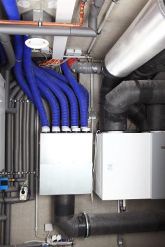 A whole-house ventilation system with dedicated ducting in a new energy-efficient home. | Photo courtesy of ©iStockphoto/brebca. A whole-house ventilation system with dedicated ducting in a new energy-efficient home. | Photo courtesy of ©iStockphoto/brebca.