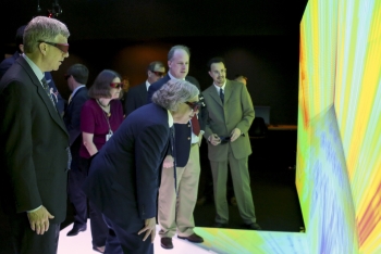 This week, Secretary Ernest Moniz experienced the 3-D visualizations at the <a href="/articles/five-years-building-next-generation-reactors-0" target="_blank">Consortium for the Advanced Simulation of Light Water Reactors (CASL)</a>, one of the Department's Energy Innovation Hubs. The facility, located at Oak Ridge National Laboratory, develops computer models that simulate nuclear power plant operations. The researchers at CASL are developing technology that could accelerate upgrades at existing nuclear plants while improving the plants' reliability and safety. <a href="/articles/secretary-moniz-visits-oak-ridge-national-laboratory" target="_blank">Check out more photos from Secretary Moniz's visit to CASL.</a> | Photo courtesy of Oak Ridge National Laboratory. This week, Secretary Ernest Moniz experienced the 3-D visualizations at the <a href="/articles/five-years-building-next-generation-reactors-0" target="_blank">Consortium for the Advanced Simulation of Light Water Reactors (CASL)</a>, one of the Department's Energy Innovation Hubs. The facility, located at Oak Ridge National Laboratory, develops computer models that simulate nuclear power plant operations. The researchers at CASL are developing technology that could accelerate upgrades at existing nuclear plants while improving the plants' reliability and safety. <a href="/articles/secretary-moniz-visits-oak-ridge-national-laboratory" target="_blank">Check out more photos from Secretary Moniz's visit to CASL.</a> | Photo courtesy of Oak Ridge National Laboratory.