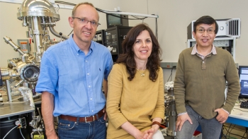Brookhaven Lab physicists Peter Sutter, Eli Sutter,and Xiao Tong (left to right) with one of the Center for Functional Nanomaterials instruments used to characterize the new nanoparticle structures. | Photo courtesy of Brookhaven National Lab. Brookhaven Lab physicists Peter Sutter, Eli Sutter,and Xiao Tong (left to right) with one of the Center for Functional Nanomaterials instruments used to characterize the new nanoparticle structures. | Photo courtesy of Brookhaven National Lab.