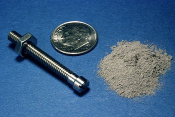 Using gas atomization technology developed at the Ames Lab (click through the photo to see a video), IPAT will be able to make titanium powder 10 times more efficiently than traditional powder-making methods. Above right, 1.8 grams of gas atomized titanium powder makes a finished 1.8 gram titanium bolt. | Image Courtesy of IPAT Using gas atomization technology developed at the Ames Lab (click through the photo to see a video), IPAT will be able to make titanium powder 10 times more efficiently than traditional powder-making methods. Above right, 1.8 grams of gas atomized titanium powder makes a finished 1.8 gram titanium bolt. | Image Courtesy of IPAT