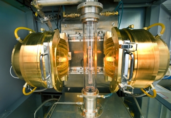 Many of the materials that scientists work with at Brookhaven National Laboratory are too small and too precise for traditional tools. In cases like these, the labs grow materials instead of building them. Brookhaven physicist Genda Gu pioneered techniques that grow some of the largest single-crystal high-temperature superconductors in the world. The glowing chamber in this photo grows superconducting crystals. To do so, the furnace focuses infrared light onto a rod, melting it around 4,000 degrees Fahrenheit. Under just the right conditions, the liquefied material recrystallizes as a single uniform structure, which is highly sensitive and takes about one month to form. | Photo courtesy of Brookhaven National Laboratory. Many of the materials that scientists work with at Brookhaven National Laboratory are too small and too precise for traditional tools. In cases like these, the labs grow materials instead of building them. Brookhaven physicist Genda Gu pioneered techniques that grow some of the largest single-crystal high-temperature superconductors in the world. The glowing chamber in this photo grows superconducting crystals. To do so, the furnace focuses infrared light onto a rod, melting it around 4,000 degrees Fahrenheit. Under just the right conditions, the liquefied material recrystallizes as a single uniform structure, which is highly sensitive and takes about one month to form. | Photo courtesy of Brookhaven National Laboratory.