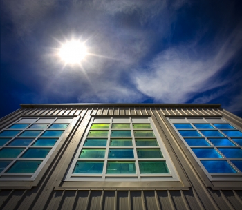 Researchers at Berkeley Lab helped develop the first energy-efficient dual-paned windows, now used in buildings and homes worldwide for billions of dollars in energy savings. Current windows research in the Environmental Energy Technologies Division at Berkeley Lab is aimed at developing new glazing materials, windows simulation software and other advanced high-performance window systems. The building shown here, located at Berkeley Lab, is a windows testing facility. | Photo courtesy of Roy Kaltschmidt, Lawrence Berkeley National Laboratory. Researchers at Berkeley Lab helped develop the first energy-efficient dual-paned windows, now used in buildings and homes worldwide for billions of dollars in energy savings. Current windows research in the Environmental Energy Technologies Division at Berkeley Lab is aimed at developing new glazing materials, windows simulation software and other advanced high-performance window systems. The building shown here, located at Berkeley Lab, is a windows testing facility. | Photo courtesy of Roy Kaltschmidt, Lawrence Berkeley National Laboratory.