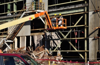 This summer, workers began preparing K-31 for Wednesdayâs demolition by conducting asbestos abatement and removing the facilityâs exterior transite paneling. This summer, workers began preparing K-31 for Wednesdayâs demolition by conducting asbestos abatement and removing the facilityâs exterior transite paneling.
