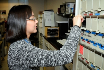 Hnin Khaing of WIPP Laboratories checks a radiological sample, similar to what would be analyzed in an event like the one simulated in the exercise to test national readiness to respond to a large radiological event. Hnin Khaing of WIPP Laboratories checks a radiological sample, similar to what would be analyzed in an event like the one simulated in the exercise to test national readiness to respond to a large radiological event.