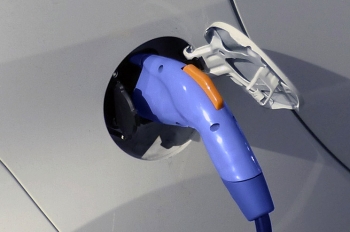 Consider the convenient options for plugging in an electric vehicle at home. | Photo courtesy of Tony Markel , NREL 18488. Consider the convenient options for plugging in an electric vehicle at home. | Photo courtesy of Tony Markel , NREL 18488.