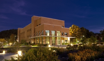 Night view of exterior of the Joint Institute for Biological Sciences, which houses the BioEnergy Science Center laboratories at Oak Ridge National Laboratory. | Photo courtesy of Oak Ridge National Laboratory. Night view of exterior of the Joint Institute for Biological Sciences, which houses the BioEnergy Science Center laboratories at Oak Ridge National Laboratory. | Photo courtesy of Oak Ridge National Laboratory.