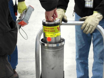 A container holding plutonium-bearing materials is placed inside an outer container. A number of these containers at SRS go through examinations each year to look for signs of degradation. A container holding plutonium-bearing materials is placed inside an outer container. A number of these containers at SRS go through examinations each year to look for signs of degradation.