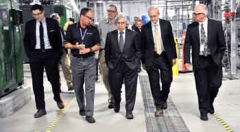 Energy Secretary Ernest Moniz tours the 200 West Pump and Treat System, which treats chemical and radionuclide contamination in Hanfordâs groundwater. Pictured, left to right, are Special Assistant to the Secretary Mark Appleton, Bob Popielarczyk of CH2M HILL Plateau Remediation Company, Special Assistant to the Secretary T.J. Augustine, Secretary Ernest Moniz, EM Senior Advisor Dave Huizenga and DOE Richland Operations Office Deputy Manager Doug Shoop. Energy Secretary Ernest Moniz tours the 200 West Pump and Treat System, which treats chemical and radionuclide contamination in Hanfordâs groundwater. Pictured, left to right, are Special Assistant to the Secretary Mark Appleton, Bob Popielarczyk of CH2M HILL Plateau Remediation Company, Special Assistant to the Secretary T.J. Augustine, Secretary Ernest Moniz, EM Senior Advisor Dave Huizenga and DOE Richland Operations Office Deputy Manager Doug Shoop.