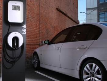 An electric vehicle uses a charging station. | Media photo from ECOtality An electric vehicle uses a charging station. | Media photo from ECOtality