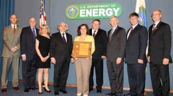 Energy Secretary Ernest Moniz, fourth from left, and Deputy Secretary Daniel Poneman, third from right, present the Secretary's Achievement Award to members of the Savannah River Site F-Tank Farm Closure Team. Team members pictured, left to right, are James Rush, William Levitan, Kathleen Martin, Linda Suttora, James Herbert, Kim Hauer, and Daniel Wood. Energy Secretary Ernest Moniz, fourth from left, and Deputy Secretary Daniel Poneman, third from right, present the Secretary's Achievement Award to members of the Savannah River Site F-Tank Farm Closure Team. Team members pictured, left to right, are James Rush, William Levitan, Kathleen Martin, Linda Suttora, James Herbert, Kim Hauer, and Daniel Wood.