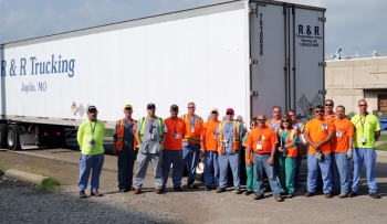Waste management and transportation personnel worked late to complete the first shipment to WCS. Through a contract with DOE, WCS will treat and accept potentially hazardous waste that has been at the Portsmouth site for decades. Pictured (from left) are Scott Fraser, Joe Hawes, Craig Herrmann, Jim Book, John Lee, John Perry, Josh Knipp, Melissa Dunsieth, Randy Barr, Rick Williams, Janet Harris, Maureen Fischels, Cecil McCoy, Trent Eckert, Anthony Howard and Chris Ashley. Waste management and transportation personnel worked late to complete the first shipment to WCS. Through a contract with DOE, WCS will treat and accept potentially hazardous waste that has been at the Portsmouth site for decades. Pictured (from left) are Scott Fraser, Joe Hawes, Craig Herrmann, Jim Book, John Lee, John Perry, Josh Knipp, Melissa Dunsieth, Randy Barr, Rick Williams, Janet Harris, Maureen Fischels, Cecil McCoy, Trent Eckert, Anthony Howard and Chris Ashley.