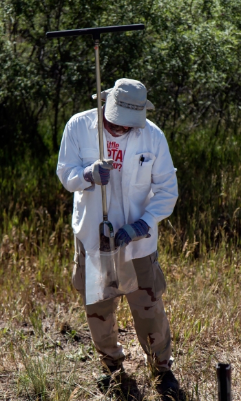 Sampling locations are on steep, heavily vegetated terrain requiring subcontractor TerranearPMC crews to take hand-augured samples rather than using a drill rig. Sampling locations are on steep, heavily vegetated terrain requiring subcontractor TerranearPMC crews to take hand-augured samples rather than using a drill rig.