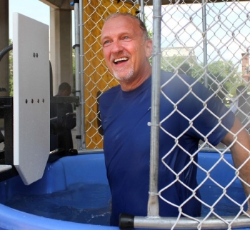 Senior Advisor for Environmental Management David Huizenga stands after falling into a dunk tank during an event to collect nonperishable food items for the DOE Feeds Families campaign. Senior Advisor for Environmental Management David Huizenga stands after falling into a dunk tank during an event to collect nonperishable food items for the DOE Feeds Families campaign.