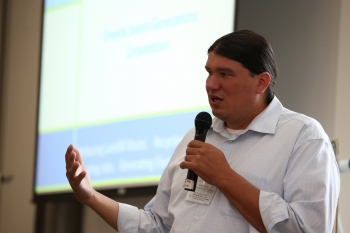 Workshop guest speaker Bill Cornelius of Oneida Seven Generations Corporation discussed the tribal renewable energy project development and finance process in action. Photo by John De La Rosa, NREL Workshop guest speaker Bill Cornelius of Oneida Seven Generations Corporation discussed the tribal renewable energy project development and finance process in action. Photo by John De La Rosa, NREL