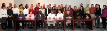 Representatives of DOE Savannah River Operations Office and liquid waste contractor Savannah River Remediation sign the next generation partnering agreement. Representatives of DOE Savannah River Operations Office and liquid waste contractor Savannah River Remediation sign the next generation partnering agreement.