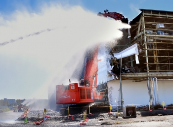 Workers begin demolishing the K-31 Building. Workers begin demolishing the K-31 Building.
