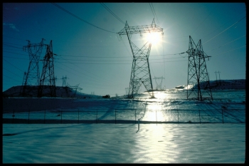 Electrical transmission lines cross a snow-covered field in Dallas Dam, Oregon. | Energy Department photo. Electrical transmission lines cross a snow-covered field in Dallas Dam, Oregon. | Energy Department photo.