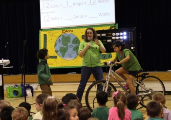Did you know: Incandescent light bulbs only convert about 10 percent of the energy they consume into light and the rest is released as heat. The Energy Department's Energy Bike demonstrates the physical effort it takes to power incandescent, compact fluorescent and LED light bulbs. Students from Churchill Road Elementary School in Virginia recently pedaled for power at their Earth Day assembly, learning firsthand about energy efficiency. | Photo courtesy of the Energy Department. Did you know: Incandescent light bulbs only convert about 10 percent of the energy they consume into light and the rest is released as heat. The Energy Department's Energy Bike demonstrates the physical effort it takes to power incandescent, compact fluorescent and LED light bulbs. Students from Churchill Road Elementary School in Virginia recently pedaled for power at their Earth Day assembly, learning firsthand about energy efficiency. | Photo courtesy of the Energy Department.