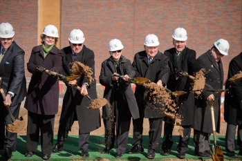 From left to right: Congressman Rogers, Senator Stabenow, Deputy Under Secretary for Science and Energy Dr. Michael Knotek, President Lou Anna Simon of Michigan State University, Senator Levin, and Chief of Staff to Governor Rick Snyder Dennis Muchmore break ground on FRIB. Photo courtesy of Michigan State University. From left to right: Congressman Rogers, Senator Stabenow, Deputy Under Secretary for Science and Energy Dr. Michael Knotek, President Lou Anna Simon of Michigan State University, Senator Levin, and Chief of Staff to Governor Rick Snyder Dennis Muchmore break ground on FRIB. Photo courtesy of Michigan State University.