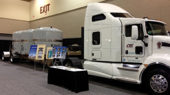 Three HalfPACT transportation packages on a Waste Isolation Pilot Plant (WIPP) truck are parked inside the exhibit hall at the 2013 Waste Management Conference. WIPP featured the exhibit as part of outreach to visitors at the annual gathering in Phoenix. Three HalfPACT transportation packages on a Waste Isolation Pilot Plant (WIPP) truck are parked inside the exhibit hall at the 2013 Waste Management Conference. WIPP featured the exhibit as part of outreach to visitors at the annual gathering in Phoenix.