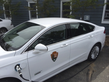 In partnership with Clean Cities, a number of National Parks are adopting alternative fuel and plug-in electric vehicles. To minimize carbon pollution and other harmful emissions, some rangers in <a href="http://www1.eere.energy.gov/cleancities/national_parks.html#sleeping" target="_blank">Sleeping Bear Dunes National Lakeshore</a> in Michigan are driving plug-in electric vehicles like this one. The park worked with the Clean Energy Coalition to deploy one propane pickup truck, three plug-in electric vehicles, and four electric vehicle charging stations. In partnership with Clean Cities, a number of National Parks are adopting alternative fuel and plug-in electric vehicles. To minimize carbon pollution and other harmful emissions, some rangers in <a href="http://www1.eere.energy.gov/cleancities/national_parks.html#sleeping" target="_blank">Sleeping Bear Dunes National Lakeshore</a> in Michigan are driving plug-in electric vehicles like this one. The park worked with the Clean Energy Coalition to deploy one propane pickup truck, three plug-in electric vehicles, and four electric vehicle charging stations.