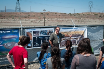 John Britton, with Office of River Protection contractor Washington River Protection Solutions, explains the Hanford tank waste program to Western Washington University students in a recent tour of the Hanford site. John Britton, with Office of River Protection contractor Washington River Protection Solutions, explains the Hanford tank waste program to Western Washington University students in a recent tour of the Hanford site.