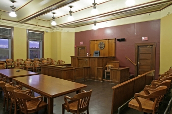 Franklin County Courthouse (After): The fully-restored main courtroom includes original 1930s paint colors and reproduction lighting. | Photo courtesy of Sallie Glaize Franklin County Courthouse (After): The fully-restored main courtroom includes original 1930s paint colors and reproduction lighting. | Photo courtesy of Sallie Glaize