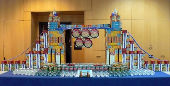 EMâs Nevada Site Office took first place in the site-submitted category of DOEâs CANstruction Sculpture Contest for its entry, shown here, inspired by Londonâs Tower Bridge during the 2012 Summer Olympics. EMâs Nevada Site Office took first place in the site-submitted category of DOEâs CANstruction Sculpture Contest for its entry, shown here, inspired by Londonâs Tower Bridge during the 2012 Summer Olympics.