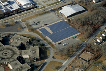 Pictured here is one of the solar arrays that is providing New Bedford with clean, renewable energy to power its municipally owned buildings. This ground-mounted solar array is built on a brownfield site. | Photo courtesy of Con Edison Solutions. Pictured here is one of the solar arrays that is providing New Bedford with clean, renewable energy to power its municipally owned buildings. This ground-mounted solar array is built on a brownfield site. | Photo courtesy of Con Edison Solutions.