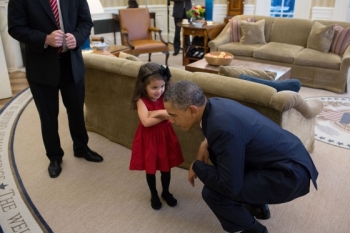 President Barack Obama bends down to listen to the daughter of a departing U.S. Secret Service agent in the Oval Office, Oct. 28, 2013. (Official White House Photo by Lawrence Jackson) President Barack Obama bends down to listen to the daughter of a departing U.S. Secret Service agent in the Oval Office, Oct. 28, 2013. (Official White House Photo by Lawrence Jackson)
