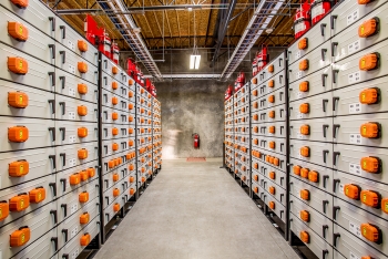 Rows of battery racks at Portland General Electricâs Salem Smart Power Center in Salem, Ore. PGE is a participant in the Battelle-led Pacific Northwest Smart Grid Demonstration Project, which will use the centerâs 5-megawatt energy storage system to test several smart grid technologies and approaches. | Photo courtesy of Portland General Electric. Rows of battery racks at Portland General Electricâs Salem Smart Power Center in Salem, Ore. PGE is a participant in the Battelle-led Pacific Northwest Smart Grid Demonstration Project, which will use the centerâs 5-megawatt energy storage system to test several smart grid technologies and approaches. | Photo courtesy of Portland General Electric.