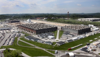 Workers near completion of the non-technetium area of K-25âs east wing (left). Oak Ridge anticipates beginning demolition on the North Tower (right) by October. Workers near completion of the non-technetium area of K-25âs east wing (left). Oak Ridge anticipates beginning demolition on the North Tower (right) by October.