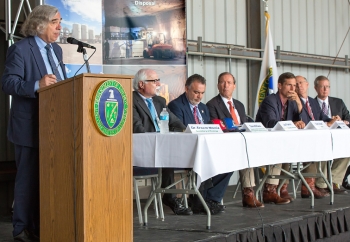 Employees from CBFO, associated DOE contractors and laboratories, elected officials, WIPP stakeholders, and leaders from New Mexico communities attended a meeting at WIPP where the Secretary (at podium) addressed the group and answered questions. Seated from left: DOE Deputy Under Secretary for Management and Performance David Klaus; Franco; U.S. Sens. Tom Udall and Martin Heinrich (N.M.); U.S. Rep. Steve Pearce (N.M.); and Bob McQuinn, president and project manager of Nuclear Waste Partnership (NWP), the WIPP management and operating contractor. Employees from CBFO, associated DOE contractors and laboratories, elected officials, WIPP stakeholders, and leaders from New Mexico communities attended a meeting at WIPP where the Secretary (at podium) addressed the group and answered questions. Seated from left: DOE Deputy Under Secretary for Management and Performance David Klaus; Franco; U.S. Sens. Tom Udall and Martin Heinrich (N.M.); U.S. Rep. Steve Pearce (N.M.); and Bob McQuinn, president and project manager of Nuclear Waste Partnership (NWP), the WIPP management and operating contractor.