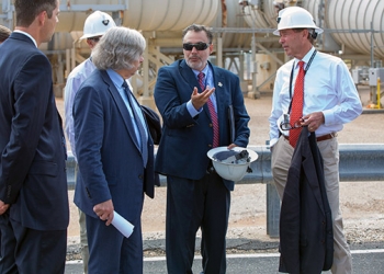 The Secretary (second from left) discusses the ventilation system at WIPP with Franco (center) and Udall (right). EM Acting Assistant Secretary Mark Whitney is on the far left. The Secretary (second from left) discusses the ventilation system at WIPP with Franco (center) and Udall (right). EM Acting Assistant Secretary Mark Whitney is on the far left.