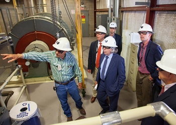 Norm Siepel of NWP explains salt hoist operations to the Secretary (center, foreground); Udall (second from left); Heinrich (second from right); Pearce; and Jonathan Black of Udallâs office (far background). Norm Siepel of NWP explains salt hoist operations to the Secretary (center, foreground); Udall (second from left); Heinrich (second from right); Pearce; and Jonathan Black of Udallâs office (far background).