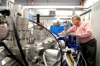 Argonne physicist Richard Pardo stands next to CARIBU | Photo Courtesy of ANL's Flickr page. Argonne physicist Richard Pardo stands next to CARIBU | Photo Courtesy of ANL's Flickr page.
