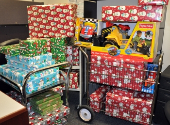 Pictured here are the Christmas gifts purchased with donations raised by EM staff for families of Nellis Air Force Base in Las Vegas. Pictured here are the Christmas gifts purchased with donations raised by EM staff for families of Nellis Air Force Base in Las Vegas.