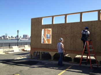 With a spectacular view of the New York City skyline, students from the Stevens Institute of Technology spent more than three months on the Hoboken Waterfront building their house, Ecohabit, and they considered it a learning process for everyone. | Photo courtesy of Stevens. With a spectacular view of the New York City skyline, students from the Stevens Institute of Technology spent more than three months on the Hoboken Waterfront building their house, Ecohabit, and they considered it a learning process for everyone. | Photo courtesy of Stevens.