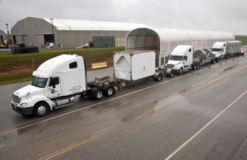 Three trucks transport nuclear waste from the Savannah River Site in South Carolina. | Energy Department photo. Three trucks transport nuclear waste from the Savannah River Site in South Carolina. | Energy Department photo.