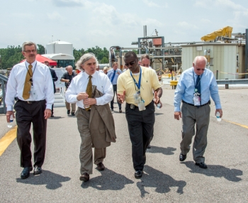 From left, Dr. Terry Michalske, director of EMâs Savannah River National Laboratory and executive vice president of Savannah River Nuclear Solutions, Energy Secretary Ernest Moniz, Savannah River Waste Disposition Operations Director Phillip Giles, and Savannah River Operations Office Manager David Moody are pictured walking at H Tank Farm. From left, Dr. Terry Michalske, director of EMâs Savannah River National Laboratory and executive vice president of Savannah River Nuclear Solutions, Energy Secretary Ernest Moniz, Savannah River Waste Disposition Operations Director Phillip Giles, and Savannah River Operations Office Manager David Moody are pictured walking at H Tank Farm.